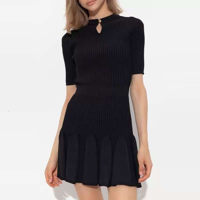2026 French retro style black knitted women's dress Spring and Autumn new hollow pleated skirt