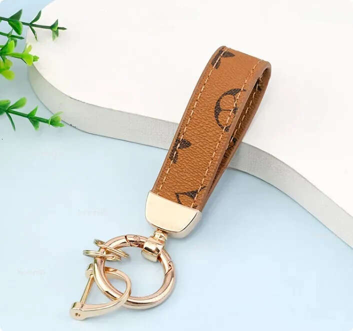 Letter pattern keychain Leather flower-shaped pendant Suitable for daily use and travel