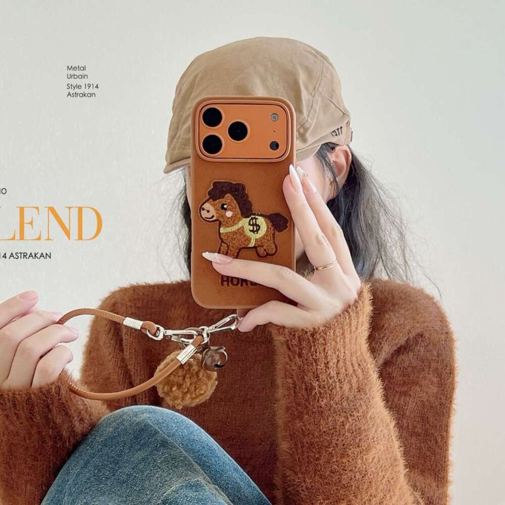 Embroidered Money Pony for Apple 17 Pro Max, iPhone 16/15/14 with Hand Strap and Pom-Pom Soft Case S260128