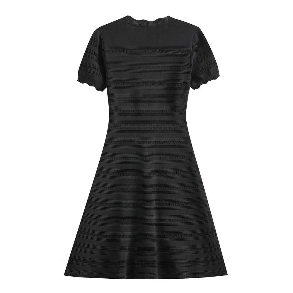 Style: 2026 Summer New Wave Edge V-neck Hollow Short Sleeve Knitted Slimming Women's Dress