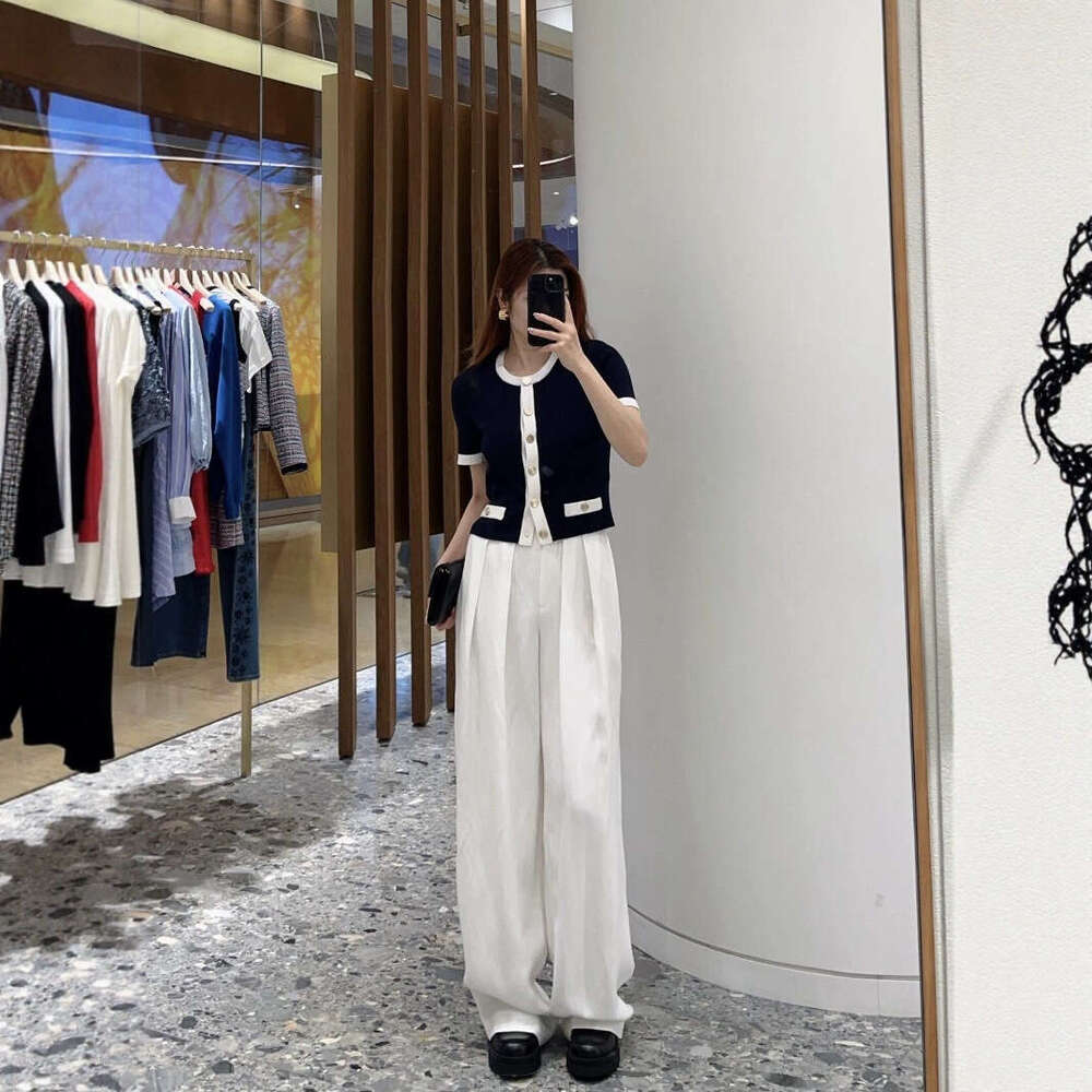 2026 summer new women's clothing color block style metal button decoration slim fit short sleeved knitted cardigan top