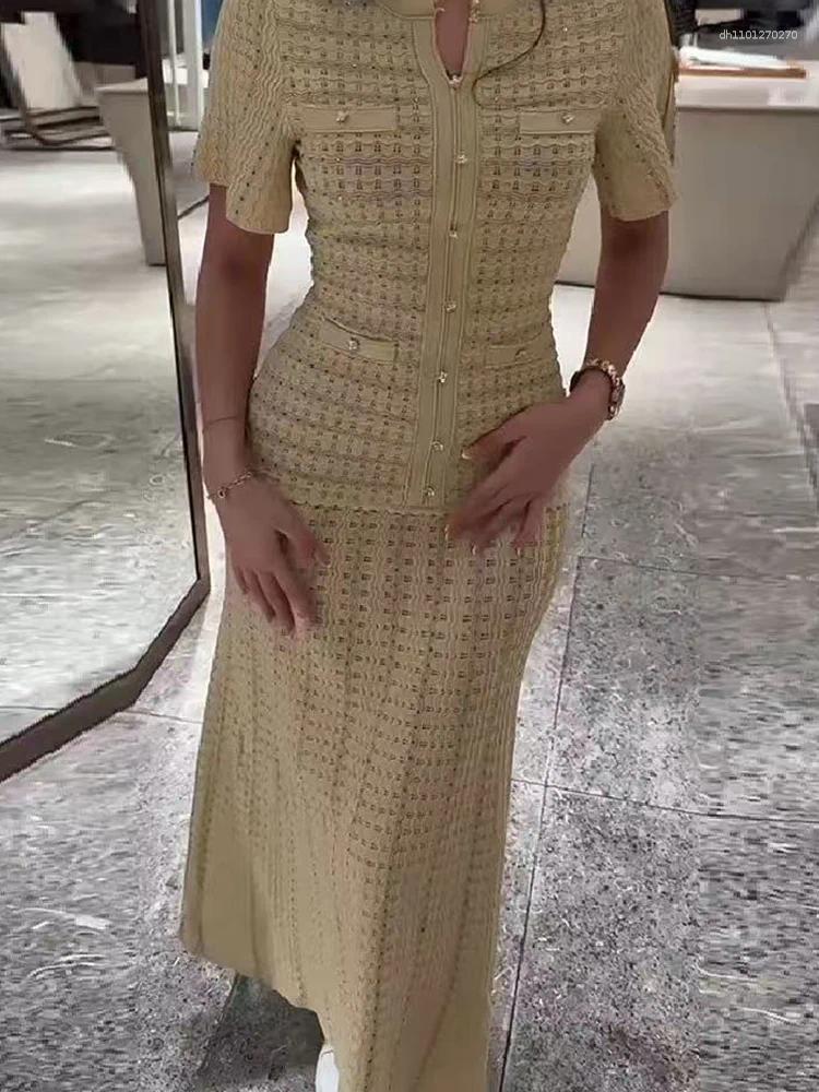 Casual Dresses 2026 Spring Fashion Beige Temperament Knit Long Dress Women Elegant O-neck Hollow-out Short Sleeve Slim Robe Ladies