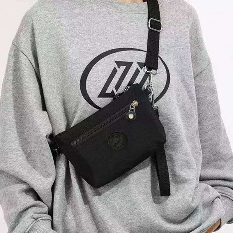 Neutral style men's women's mini shoulder bags in nylon material, suitable for travel and business use. XJ260129