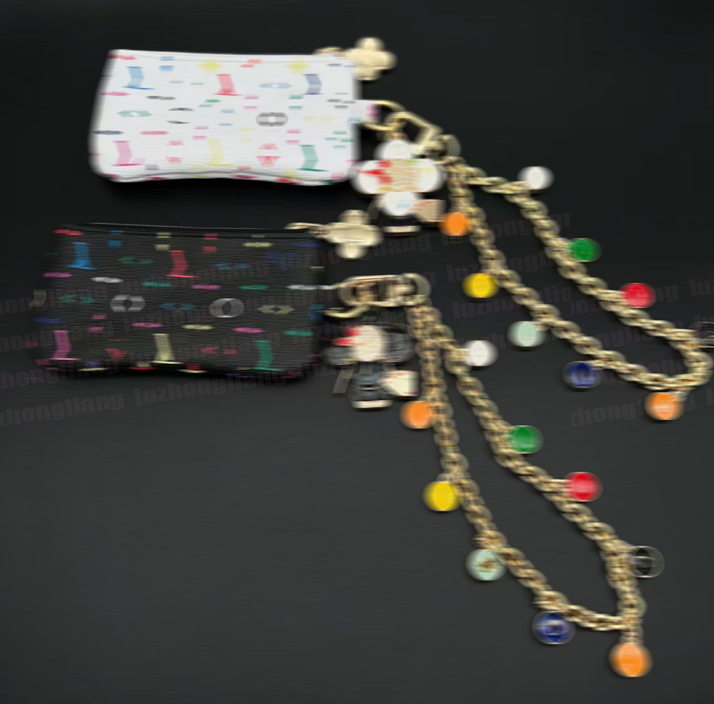 2026 New Designer Keychain Bag Pendant Fashion High-end Jewelry Pant Chain Bag Hanging Pendant Gold Sunflower Figure Keychain Wallet Pouch Keychain 20 colors