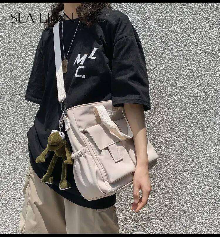 Waterproof Shoulder Women's Multi Pocket Nylon Messenger Bag Preppy Canvas Handbag Women XJ260129