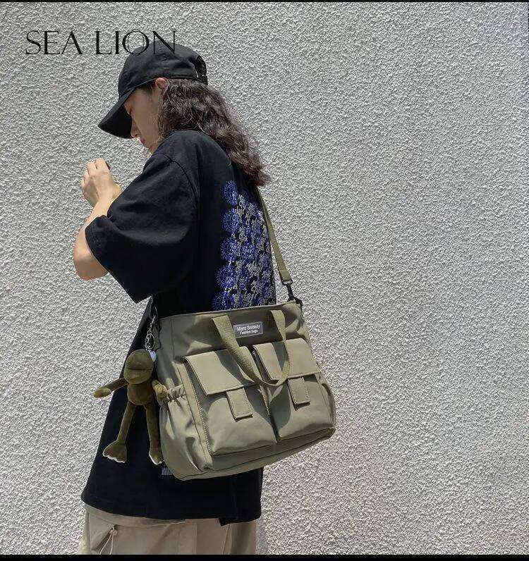 Waterproof Shoulder Women's Multi Pocket Nylon Messenger Bag Preppy Canvas Handbag Women XJ260129