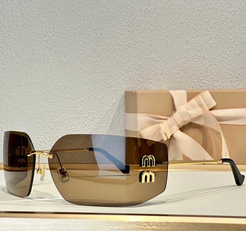 Designer Sunglasses Women Trend Frameless Curved Surface Lens Glasses Womens Luxury sun glasses cat eye shades sun glasses for women Y2K spicy girl with box