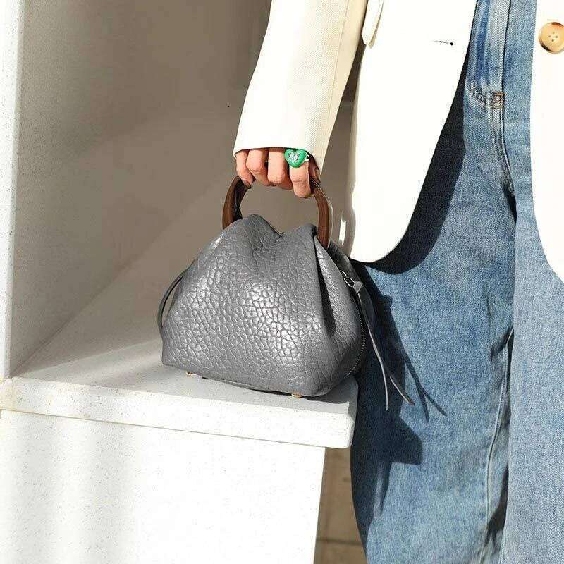 Bubble Leather Premium Texture Handbag New Niche Design Foreign Gas Bucket Messenger Women's Bag Simple Casual Personality