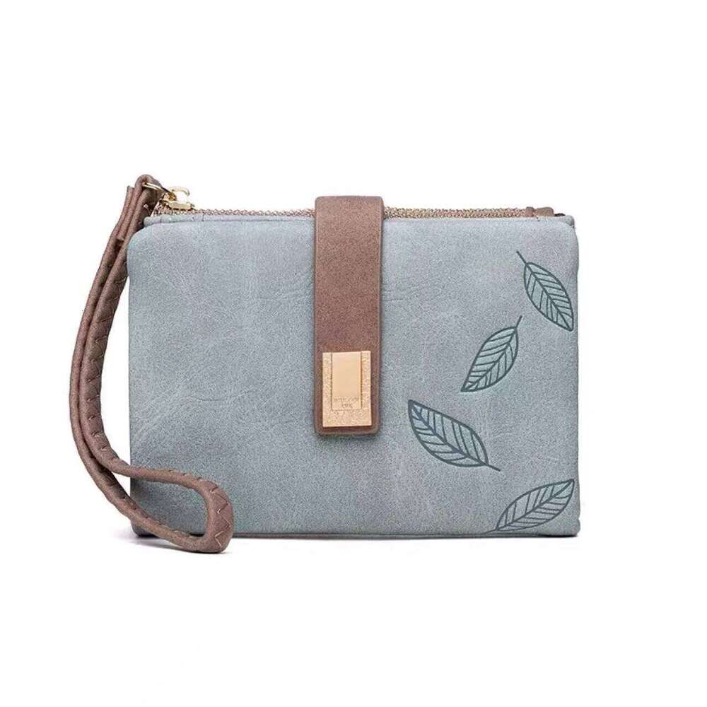 Spring/Summer 2025 new women's short wallet, high-quality PU hardware leaf buckle, solid color zipper, student coin purse, Z260130