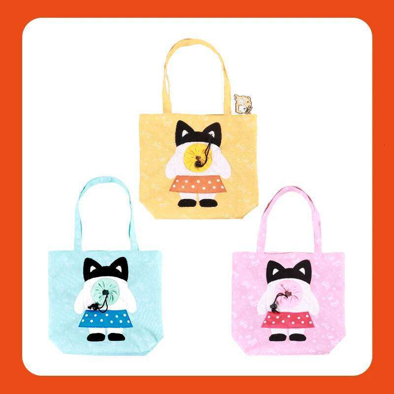 A lightweight handbag suitable for small dogs and cats weighing less than 15 pounds, featuring a padded pet bag style dog 26H0130