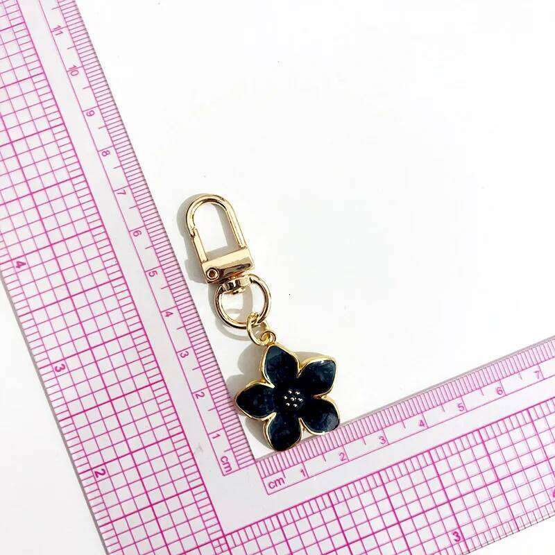 Lovely Sakura Flower Keychain Charm Enamel Pink White Black Women Bag Charms Key Ring Accessories Z260130