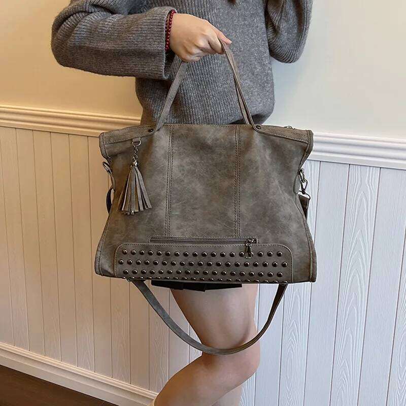 New 2023 rivet tassel motorcycle women's frosted hand-held shoulder tote luxury hand bag ladies Z260130