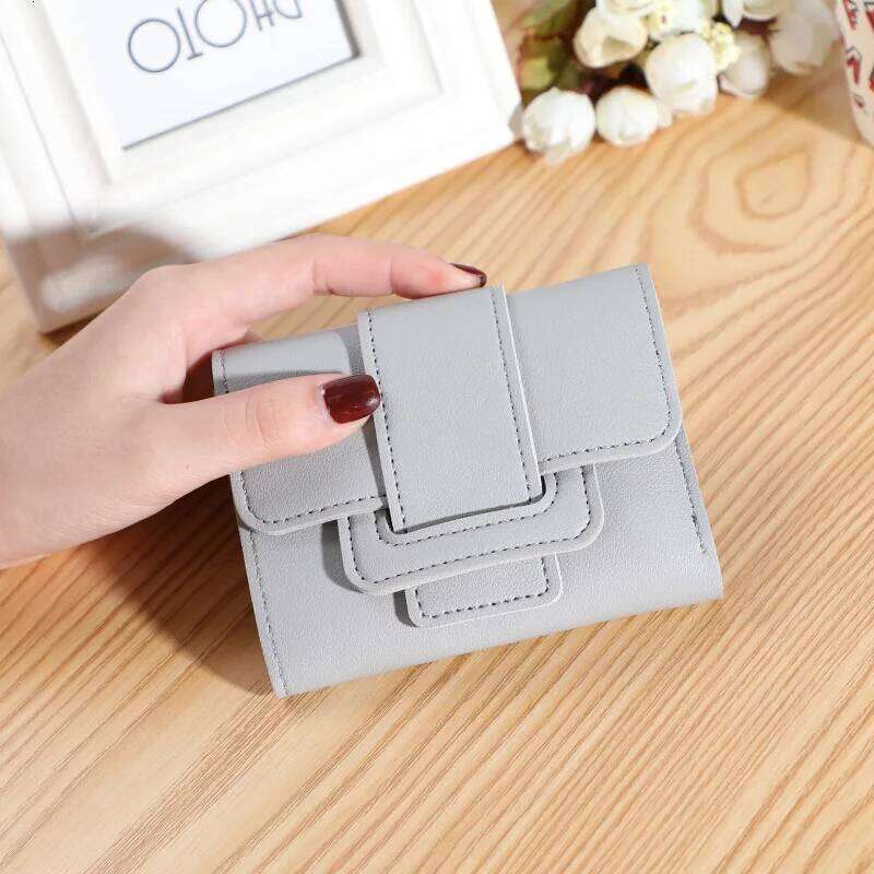 New Korean version of solid color belt ladies female coin purse clutch bag student short wallet Z260130