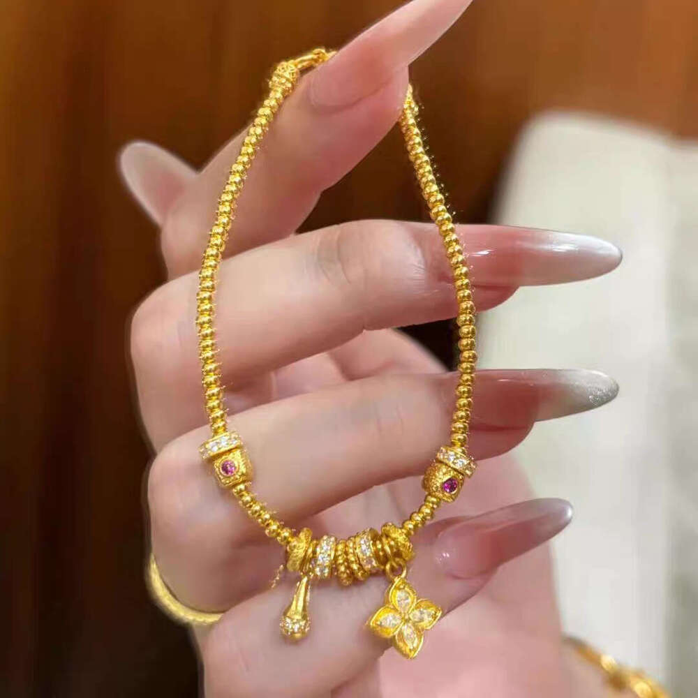 Filled Jewelry Four-Leaf Clover Water Drop Bead Bracelet for Women Imitation Gold Long-Lasting High-End Feel Wholesale