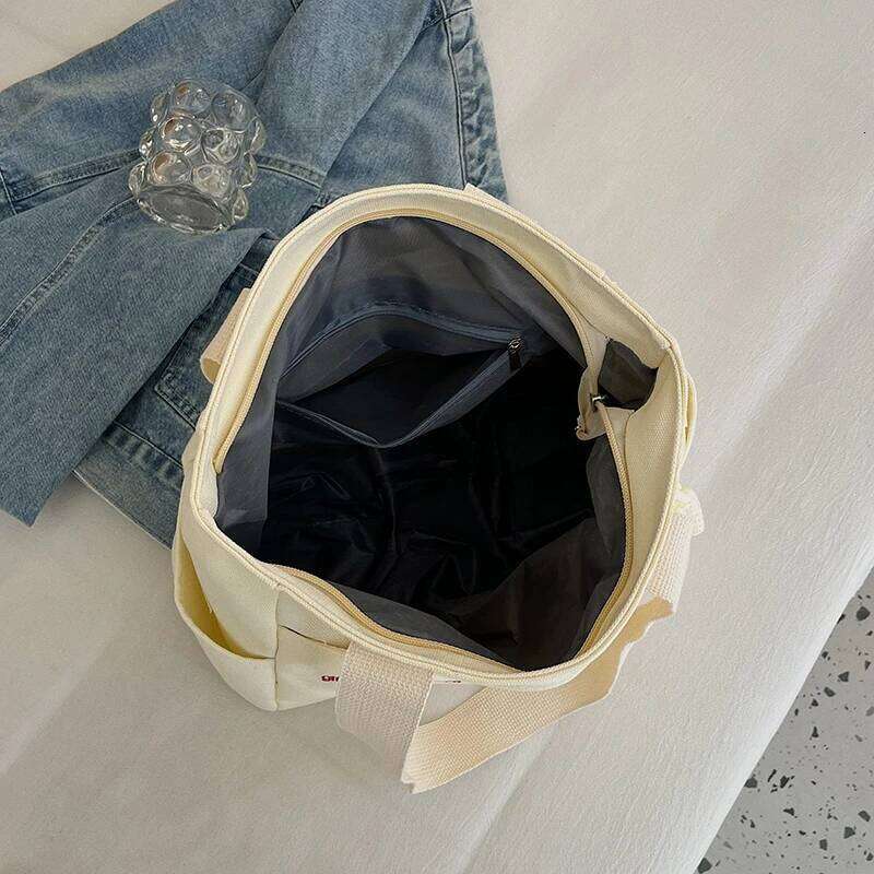 Commuting large capacity single shoulder canvas bag, women's Korean version versatile hand-held tote bag