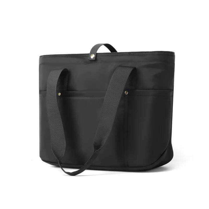 Women's portable folding storage bag with multiple compartments and adjustable shoulder strap for large capacity.