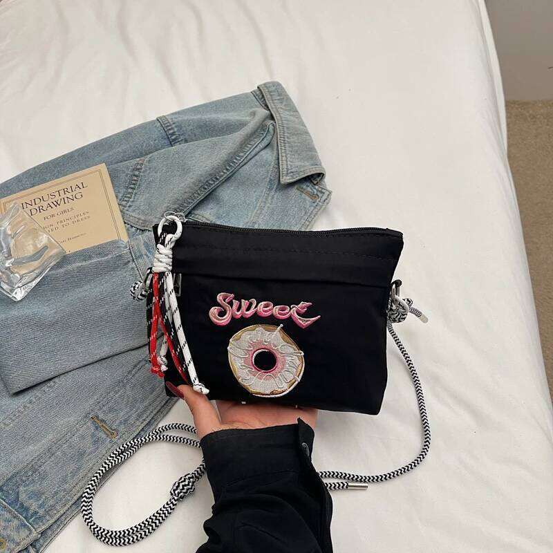 Japanese-style embroidered shoulder bag for women with unique design, large capacity, and a slanted cross-body style, small sq