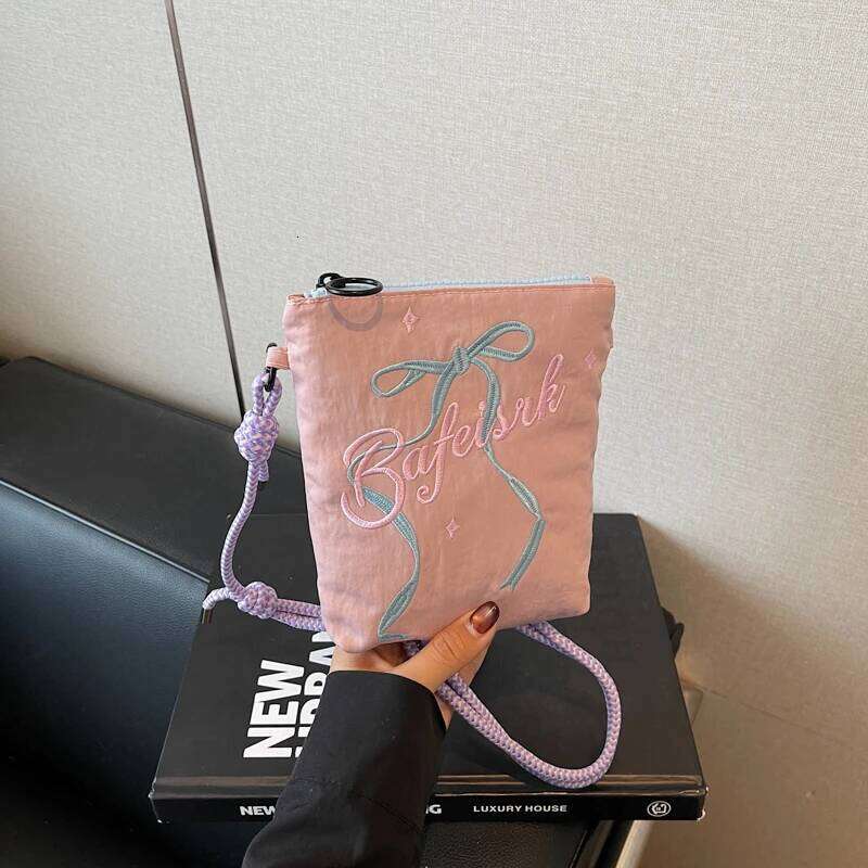 Bow embroidered crossbody bag for women, 2025 new ins niche mobile phone coin purse commuting shoulder bag.