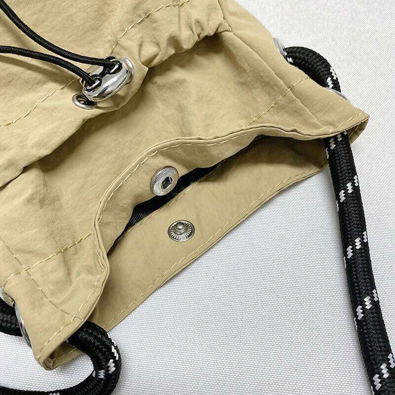 Japanese nylon small shoulder solid color vertical version mobile phone casual simple coin purse headphone bag