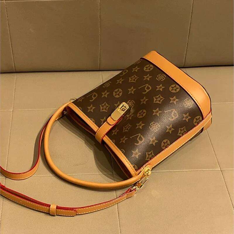 Light luxury brand women's bucket 2024 new high-end feeling autumn and winter fashion designer handbag crossbody bag