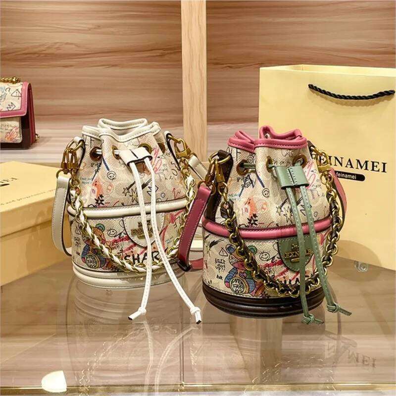 Women's Handheld Genuine Leather Drawstring 2024 Spring New Round Bucket Single Shoulder Crossbody Bag for Women
