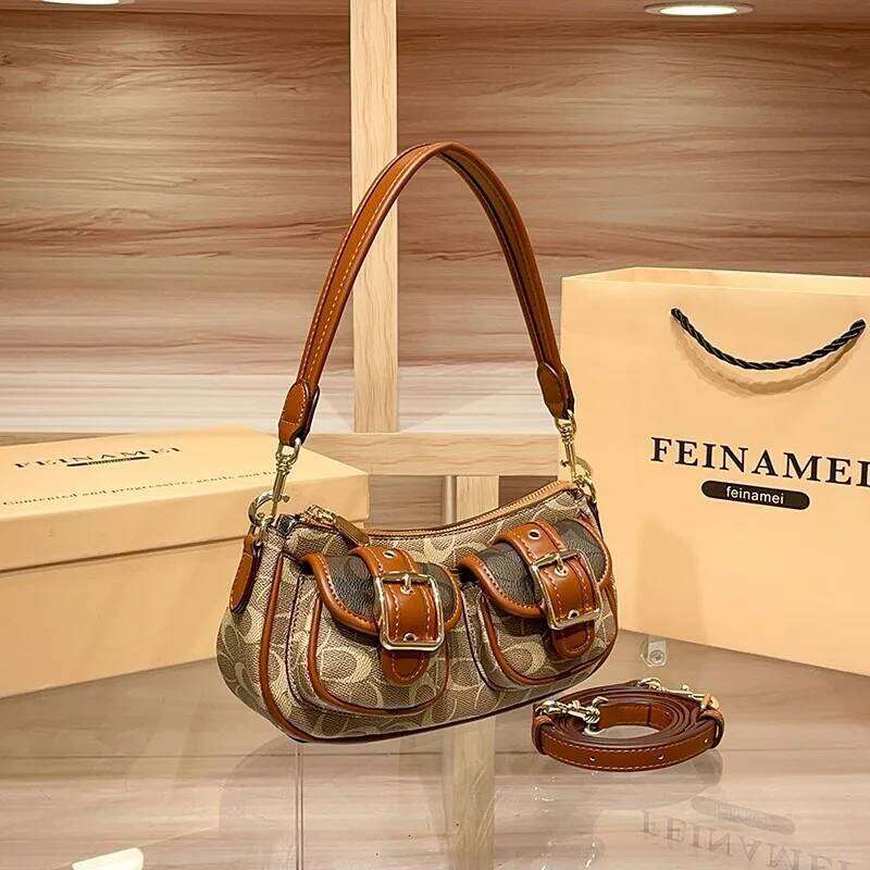 Light luxury French stick 2025 new underarm single shoulder crossbody bag, fashionable contrasting color motorcycle bag