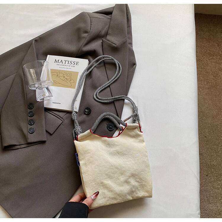 Embroidered canvas women; light single shoulder bag for spring and summer; cross-body handbag.