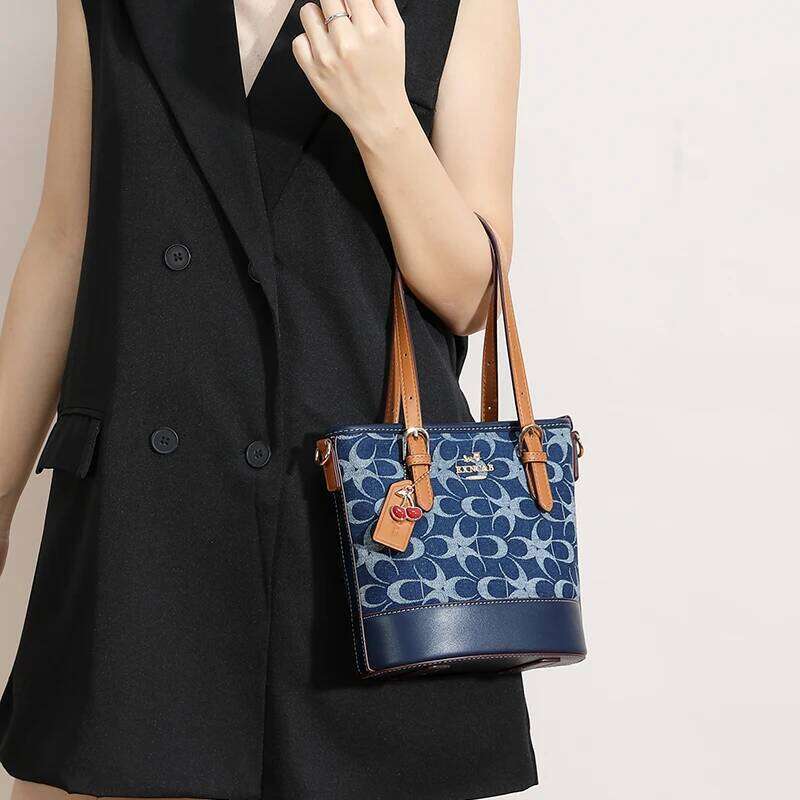 Brand denim hand-held bucket women's 2025 new fashionable and versatile shoulder bag, temperament commuting crossbo