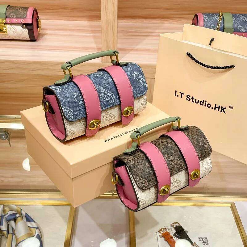 Light luxury brand women's small cylindrical bag 2025 autumn and winter new design designer high-end handbag crossbody