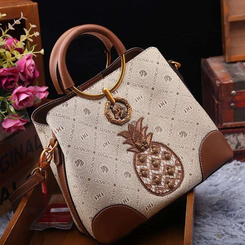 Brand designer handbag retro bucket women's 2025 new autumn and winter high-end printed shoulder crossbody bag