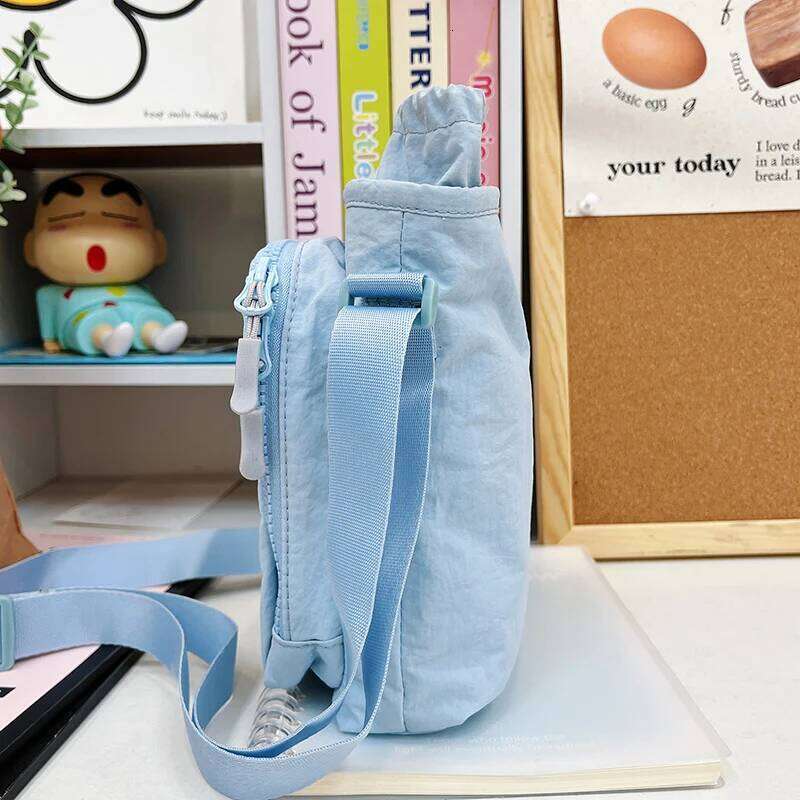 Korean style high-value mobile phone for women, casual and simple water bottle, umbrella, portable commuting crossbody bag