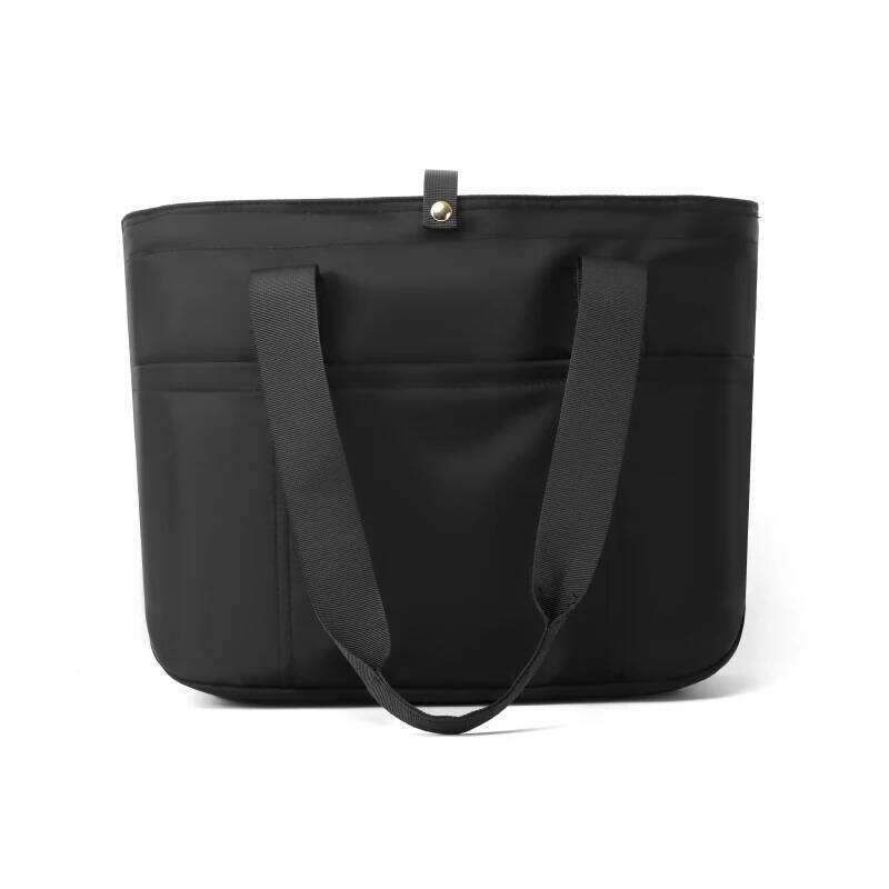 Women's portable folding storage bag with multiple compartments and adjustable shoulder strap for large capacity.