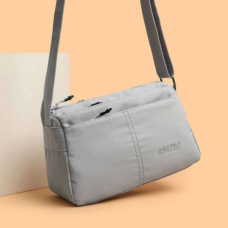 New women's crossbody - water-resistant, ultra-light fabric bag with multiple compartments, small square bag, gender-neutral