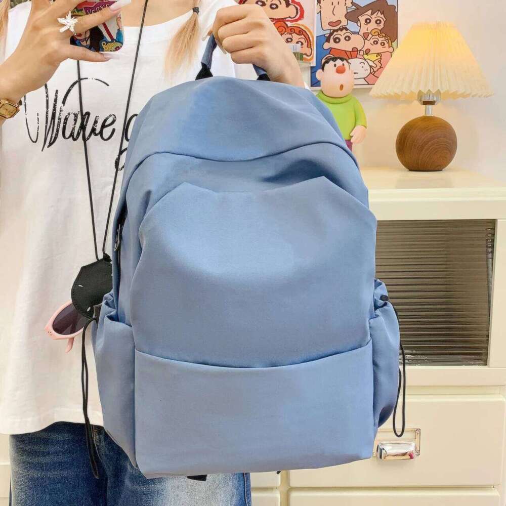 Korean-style large-capacity solid-color backpack girls Korean version, versatile bag for boys high school size, d