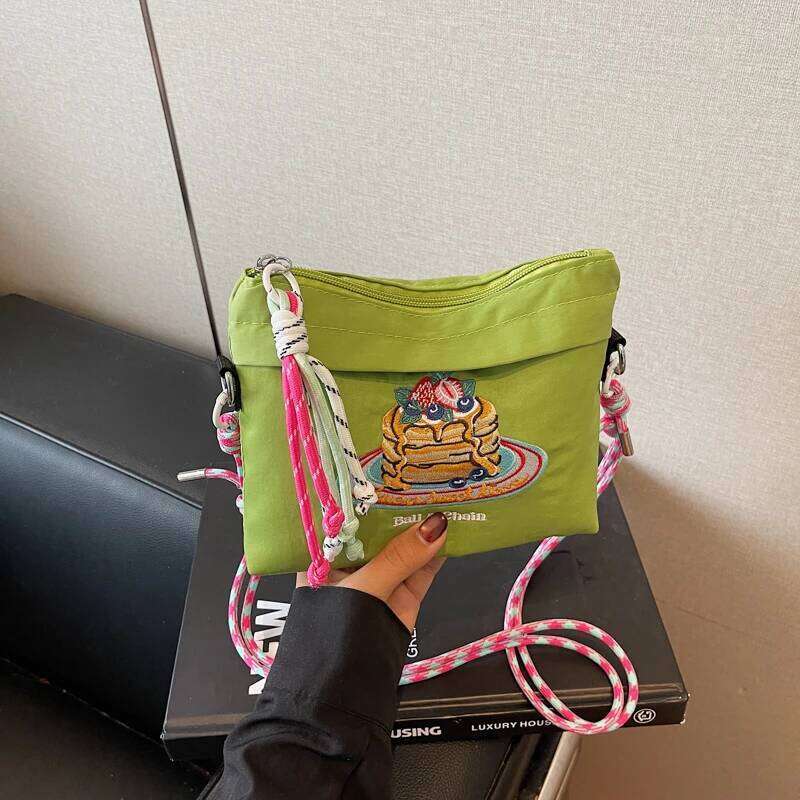 Japanese-style embroidered shoulder bag for women with unique design, large capacity, and a slanted cross-body style, small sq