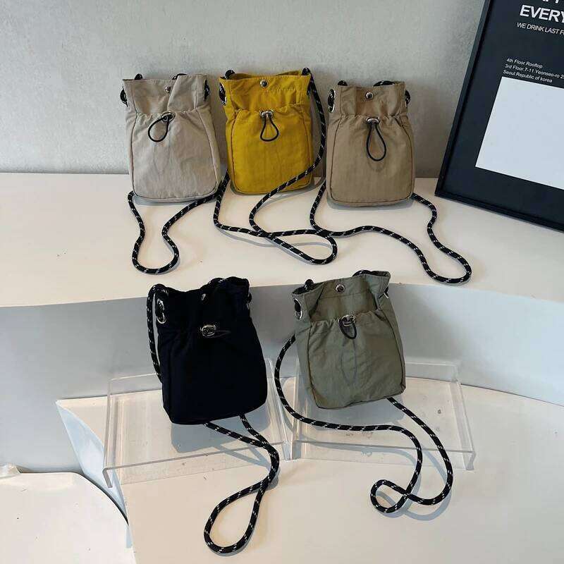 Minimalist Style Lightweight Drawstring Canvas Small Bag: Versatile Mini Single-Shoulder Crossbody Coin Purse for Mobile Phones