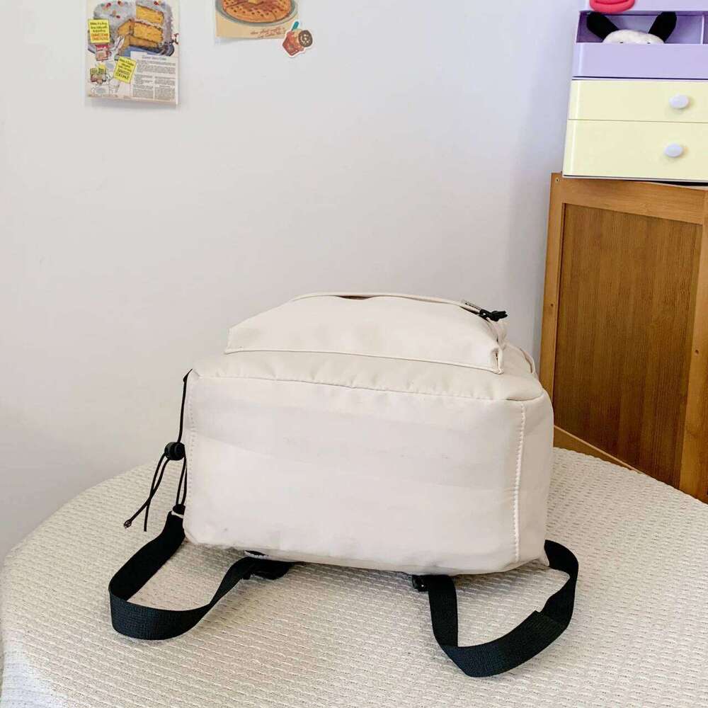 Korean-style large-capacity solid-color backpack girls Korean version, versatile bag for boys high school size, d