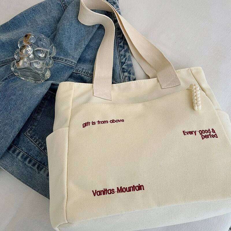 Commuting large capacity single shoulder canvas bag, women's Korean version versatile hand-held tote bag