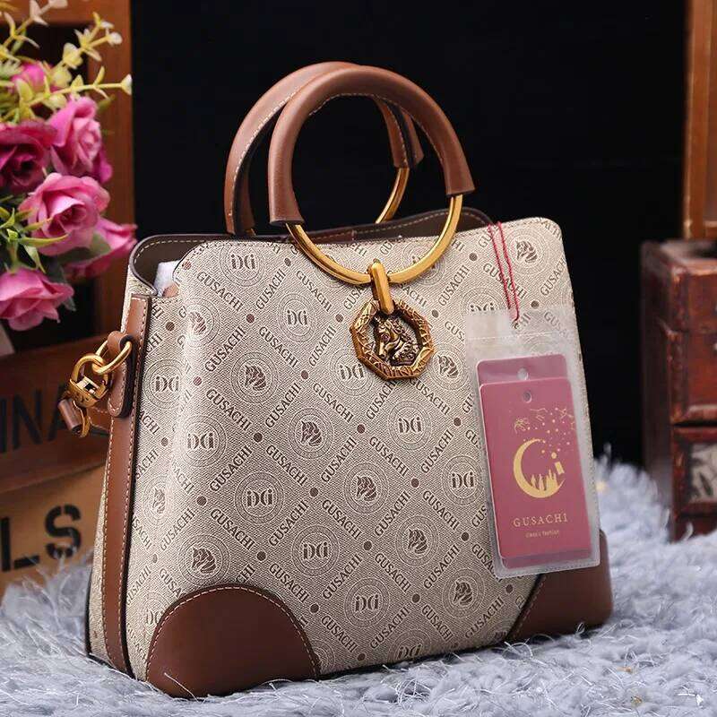 Brand designer handbag retro bucket women's 2025 new autumn and winter high-end printed shoulder crossbody bag