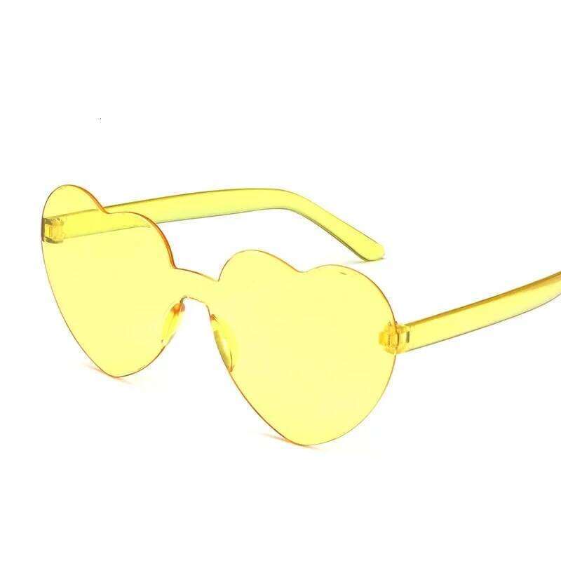 Free shipping 2024 color heart shape ocean personality Frameless Fashion Candy Love Sunglasses H260130