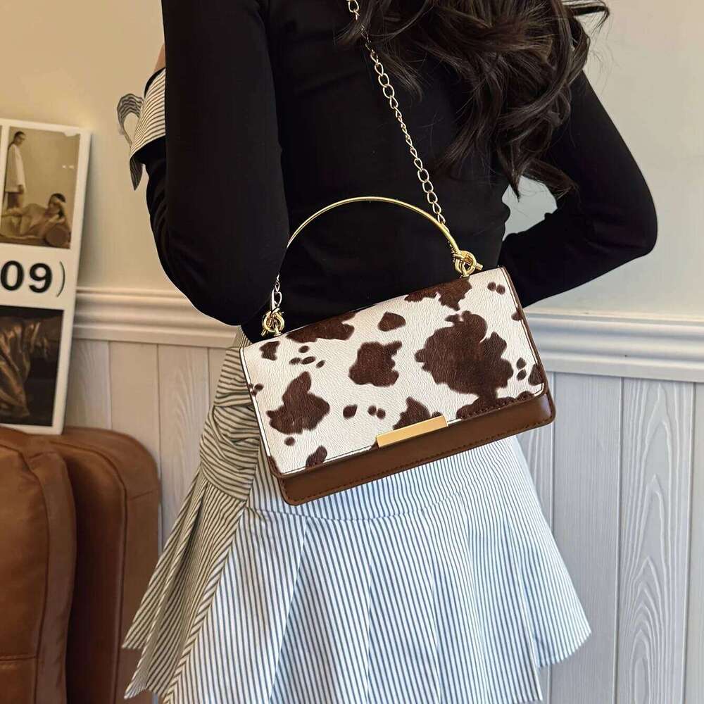 Ladies' cow print hand-held bag, crossbody with detachable chain, fashionable women's bag H260131