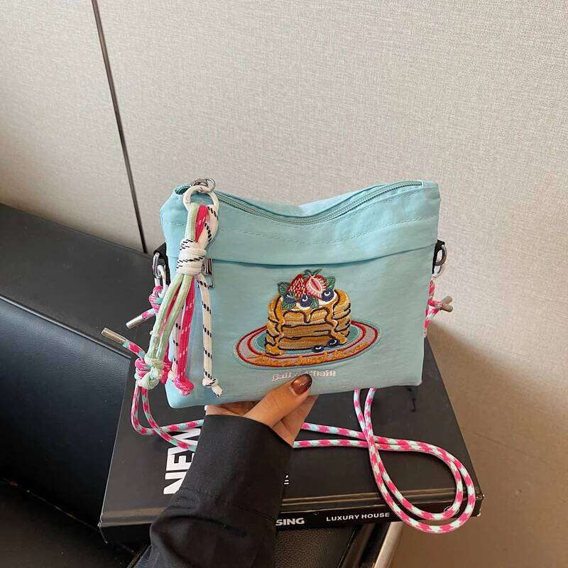 Japanese-style embroidered shoulder bag for women with unique design, large capacity, and a slanted cross-body style, small sq