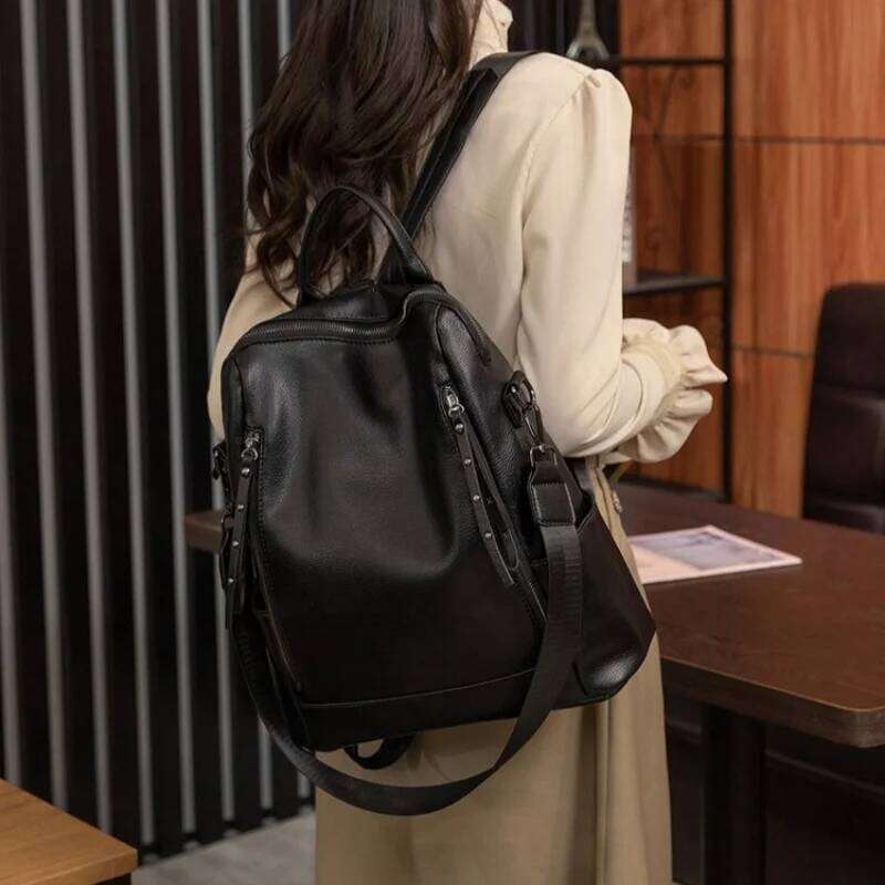 Simple Fashion Backpack Ladies Temperament Hundred Shoulder Soft Leather Solid Color Travel Computer Bag Rivet Decoration