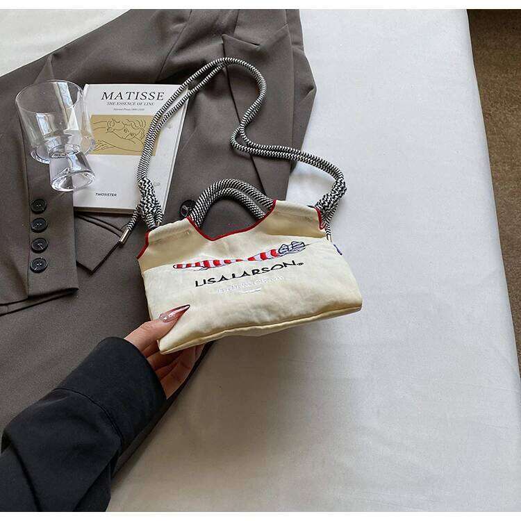 Embroidered canvas women; light single shoulder bag for spring and summer; cross-body handbag.