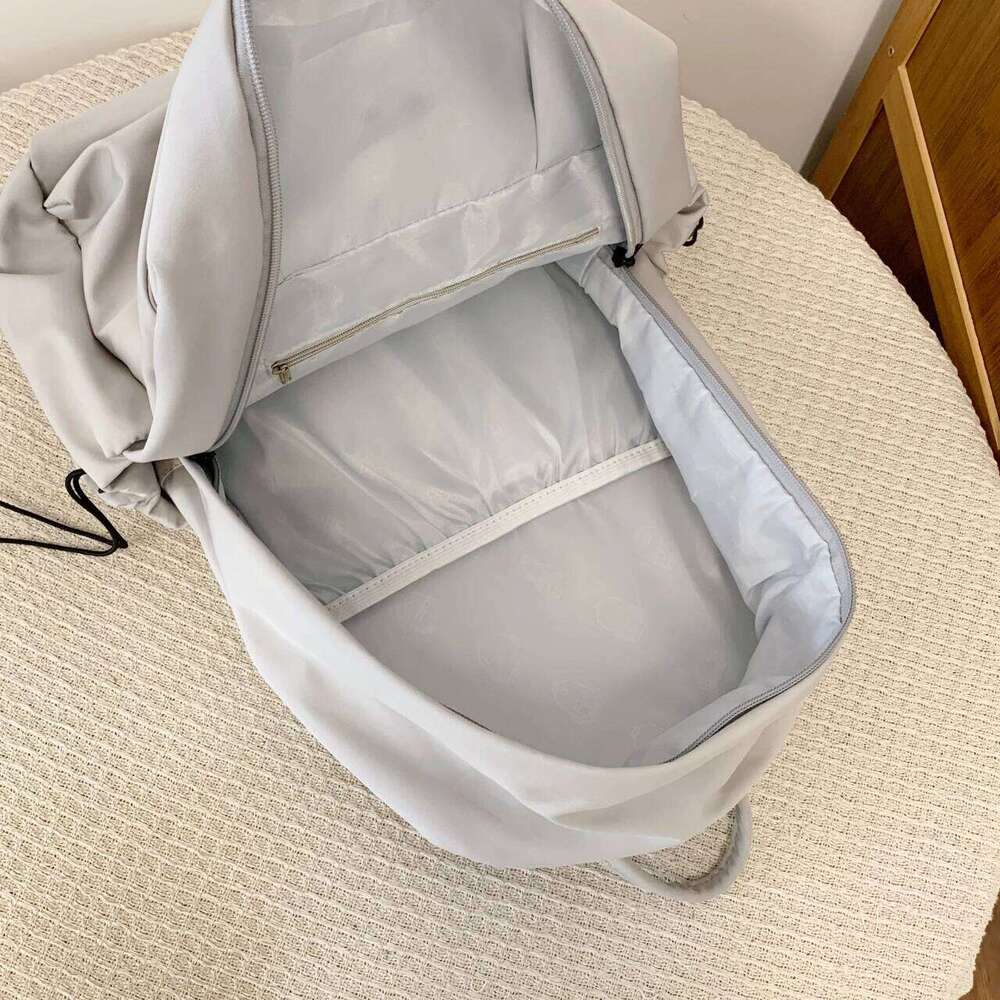 Korean-style large-capacity solid-color backpack girls Korean version, versatile bag for boys high school size, d