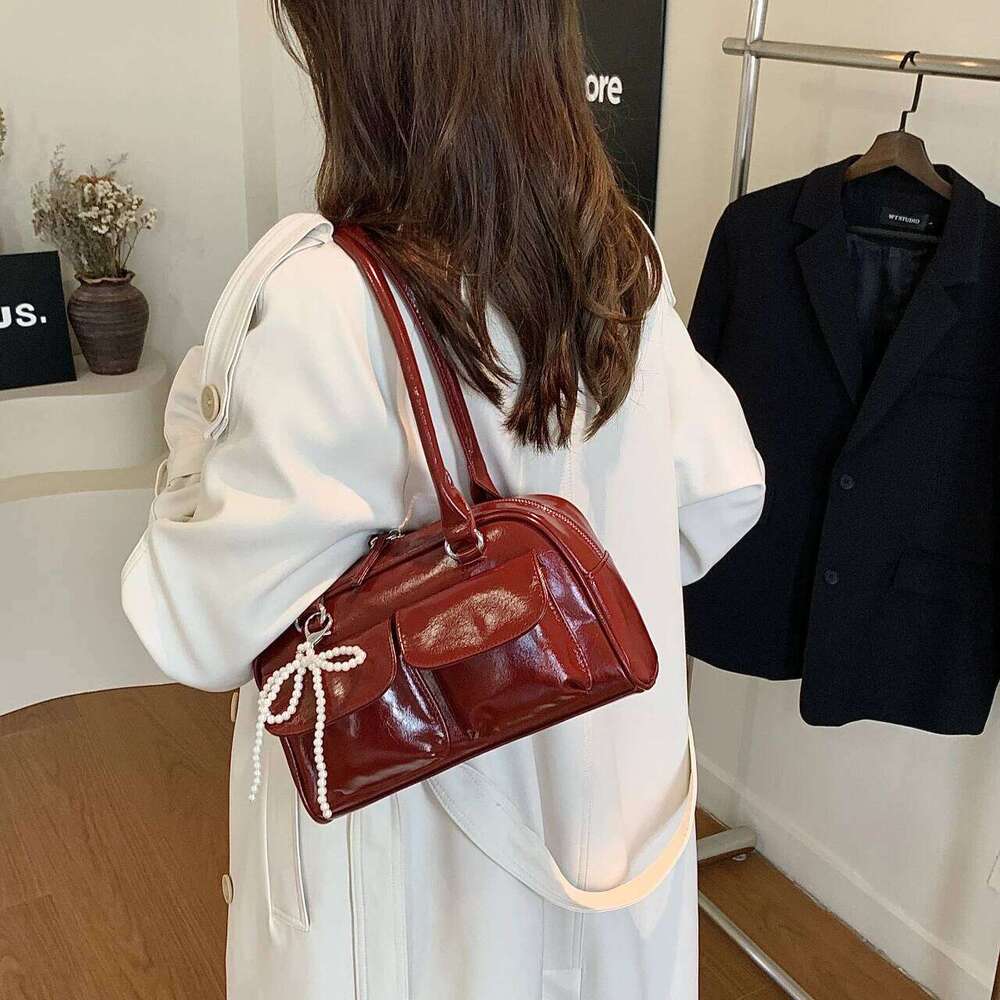 Simple casual bow tie armpit bag ladies, new Korean version for 2024; fashionable and versatile single shoulder bag.