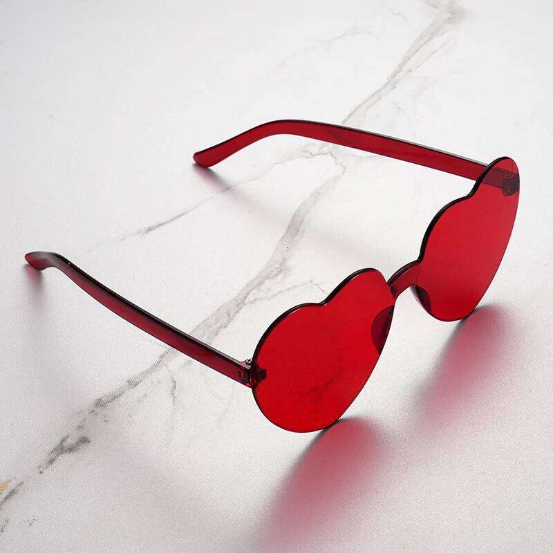 Free shipping 2024 color heart shape ocean personality Frameless Fashion Candy Love Sunglasses H260130