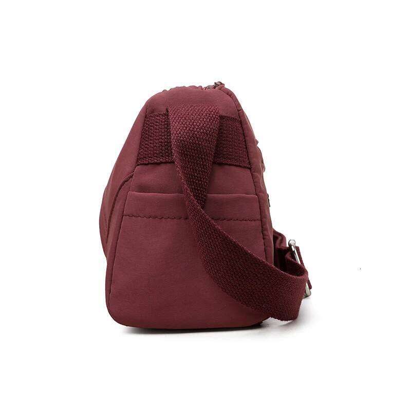 Foreign trade new shoulder lightweight simple fashion portable commuter multi-compartment outdoor crossbody shopping bag