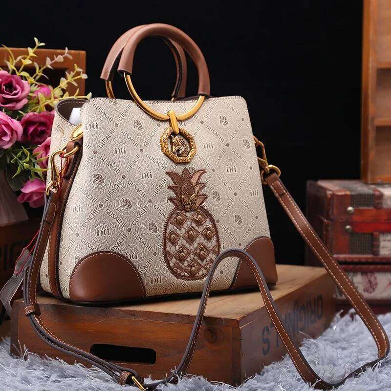 Brand designer handbag retro bucket women's 2025 new autumn and winter high-end printed shoulder crossbody bag