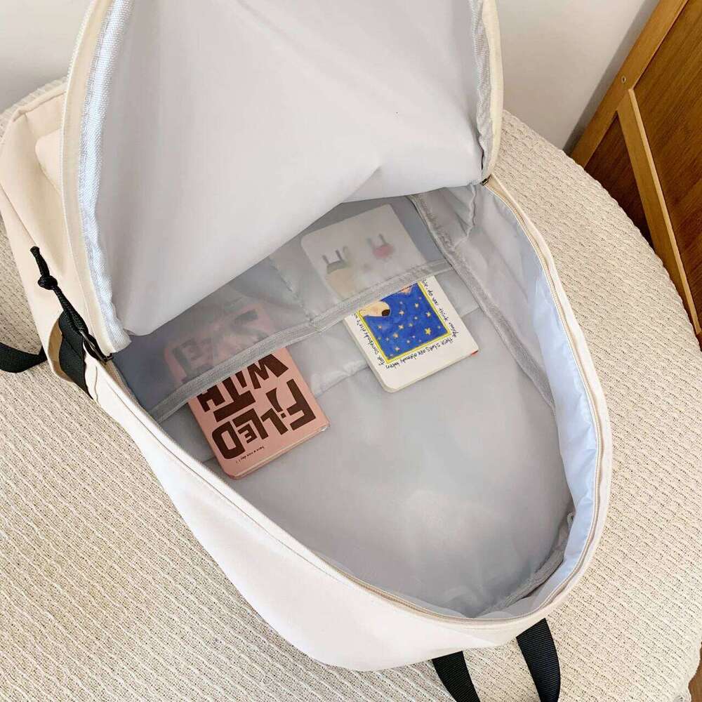 Korean-style large-capacity solid-color backpack girls Korean version, versatile bag for boys high school size, d